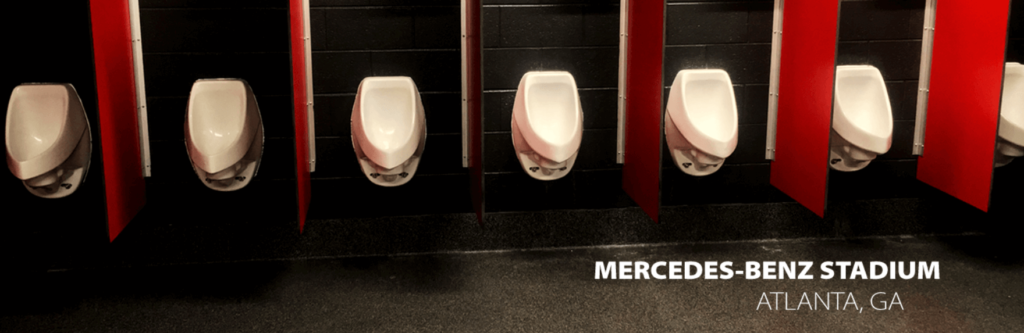 waterless urinals in stadium toilet